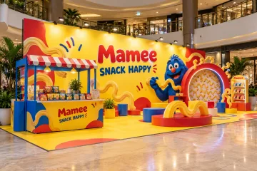 Mamee family snack roadshow with snack sampling booth, playful noodle-shaped freestanding props and family photo wall