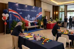Tenaga Nasional Berhad corporate family day design reference with indoor family craft and portrait area