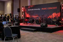 Multimedia University music concert design reference with campus band showcase stage and sound position