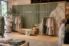 Naelofar hari raya aidilfitri design reference with boutique raya fashion display