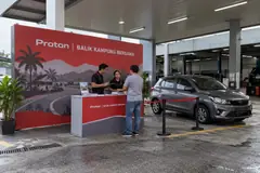 Proton balik kampung theme design reference with balik-kampung service-centre campaign booth