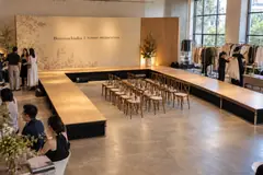 BritishIndia runway presentation design reference with gallery-style u-runway and textile backdrop